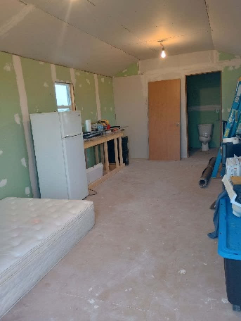 home building in progress during mission trip
