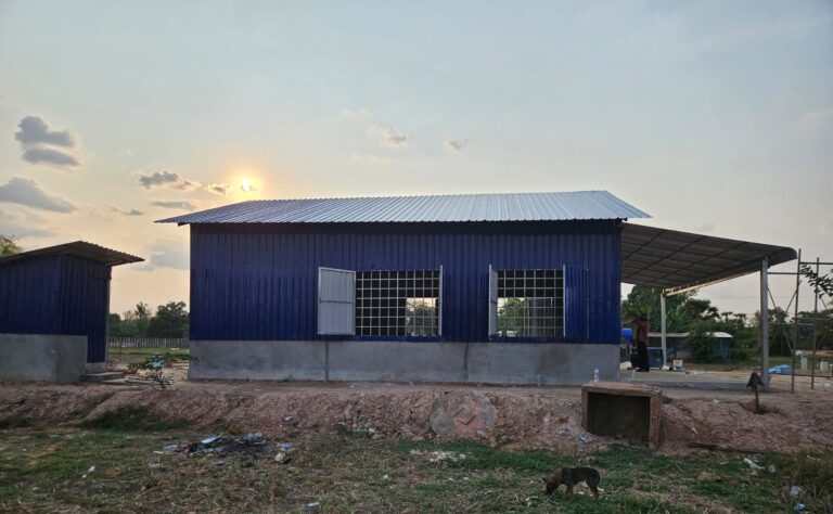 blue church in the sun construction progress photo on a mission trip