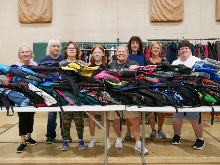 backpack giveaway to the children of reservation